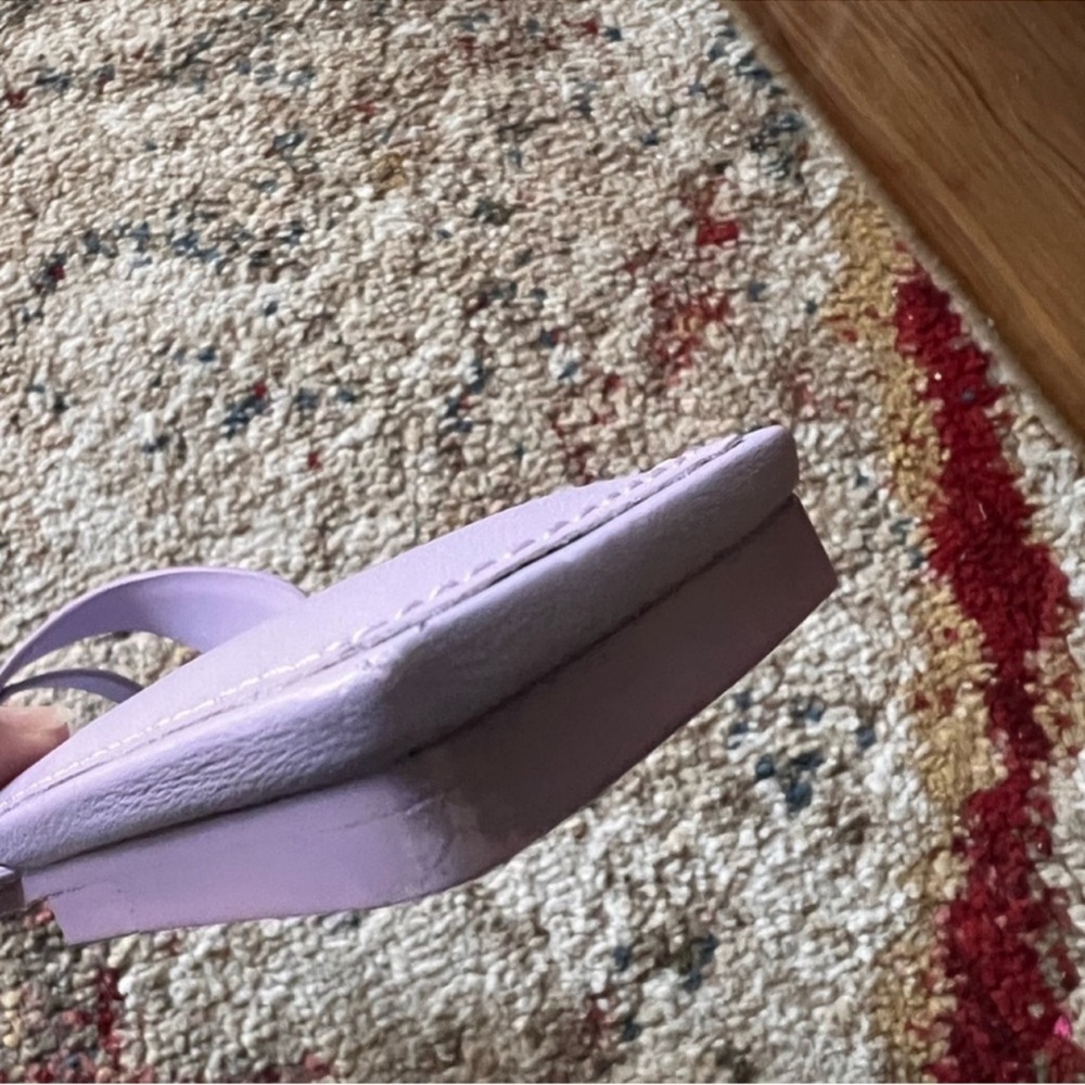 Jonathan Simkhai The Shae Sandal in Lupine in a one-toe thong design. 
Size 7 - Picture 11 of 15